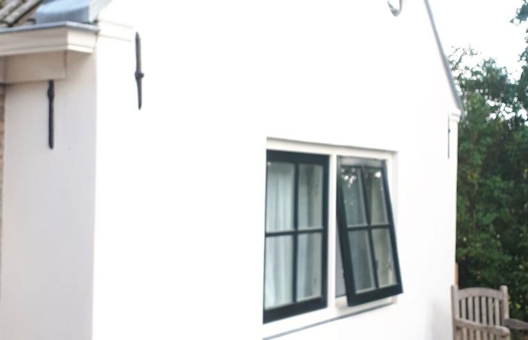 Zijaanzicht van Vakantiehuis in Nijemirdum, gelegen in de Friese bossen, Friesland.