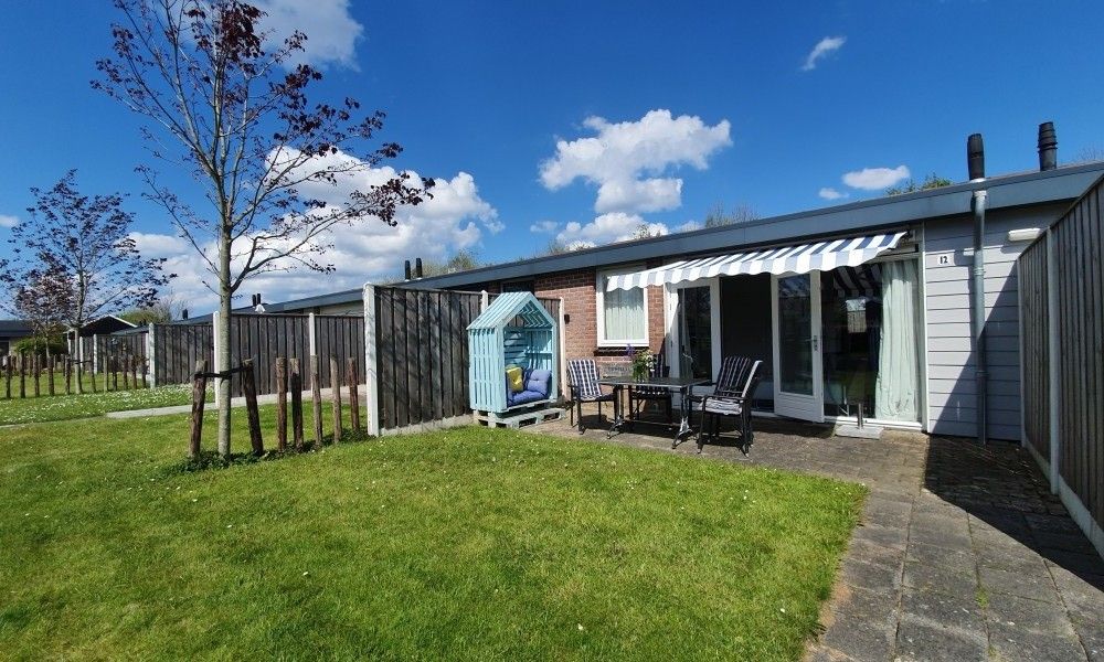 THE SUN IN STEE AAN ZEE Ferienhaus in Serooskerke mit sonnigem Garten und Terrasse, ideal fuer Entspannung in Walcheren, Zeeland.
