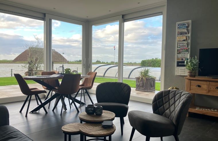 Modern kitchen and sitting area in Holiday home in Ammerstol, ideal for a comfortable vacation.