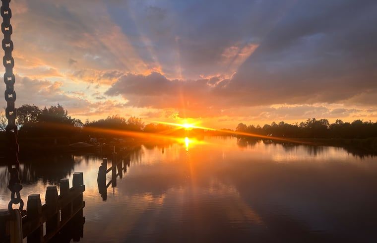 Breathtaking sunset at Huisje in Zevenhoven, vacation home in South Holland