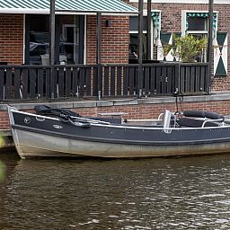 Aerial view of Delfstrahuizen with vacation home FR474 on the Tjeukemeer, Frisian Lakes.