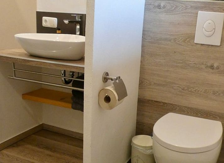 Vacation home in Murlenbach offers a stylish wine corner overlooking the green surroundings of Eifel, Moselle, Hunsruck.