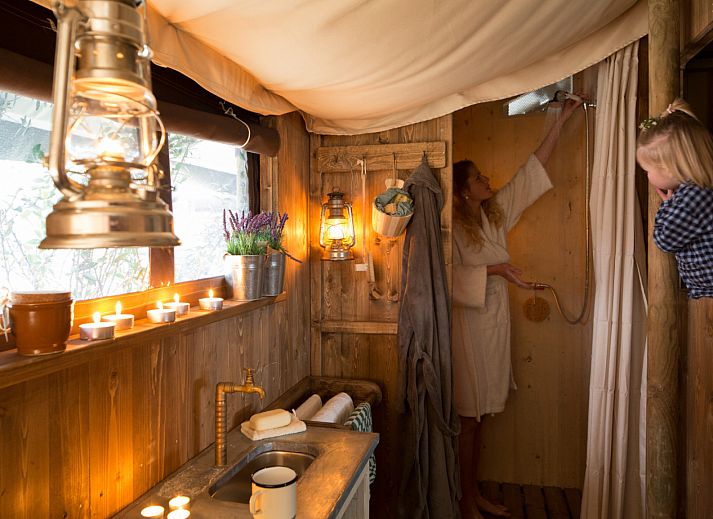 Tent house with hot private shower in Altenbeuthen, Thuringia, offers a unique glamping experience with an inviting terrace in nature.