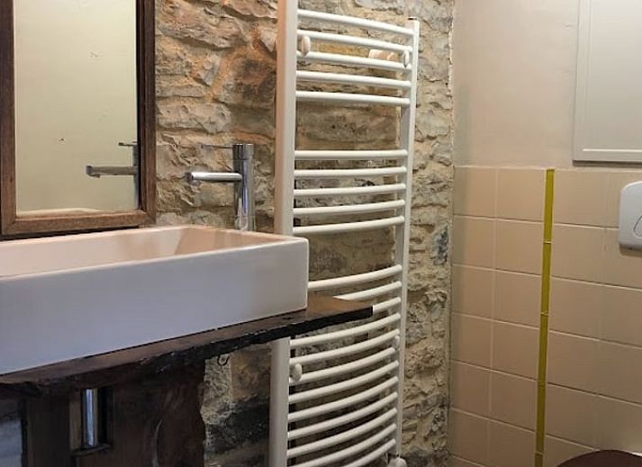 Enjoy the serene garden at Holiday home in Parisot, Midi/Pyrenees, France, with wooden patio furniture.