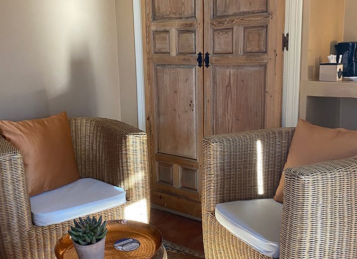 Gezellige slaapkamer in Vakantiehuis in Sedella, Andalusie. Comfort en stijl in een charmant bed and breakfast in Spanje.