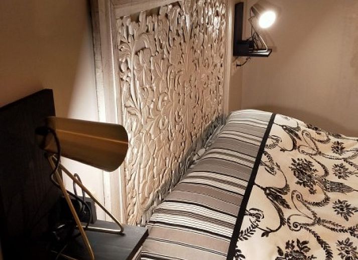 Gezellige slaapkamer in Casa Francesca, vakantiehuis in Altea, Costa Blanca, met rustieke decoratie en comfortabele ambiance.