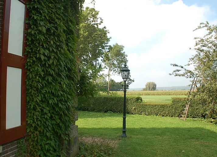 Vakantiehuis in De Steeg omgeven door uitgestrekte velden in Veluwe, Gelderland.