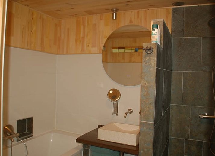 Gezellige tuin bij Vakantiehuis in De Steeg, Veluwe, Gelderland.