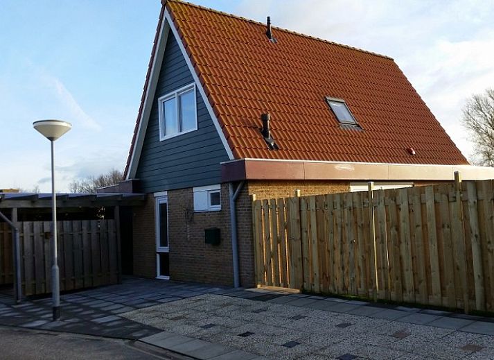 Inlaag24 vakantiehuis in Wolphaartsdijk met groene tuin en terras in Zuid-Beveland, Zeeland.