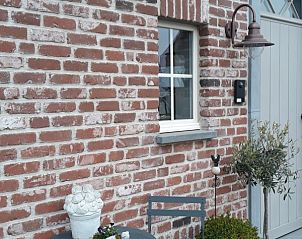 Gezellig terras bij Valant B&B in Brugge, West-Vlaanderen, ideaal voor ontspannen momenten.