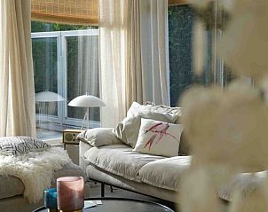 Lichte woonkamer in Zilt aan Zee | Vakantiehuis Texel, De Koog, met comfortabele zitruimte.