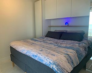 Comfortabele slaapkamer met uitzicht op zee in Nieuwpoort Zeezicht Strand Imperial appartement, Nieuwpoort-Bad.