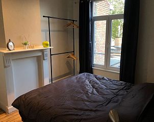 Knusse slaapkamer in Vakantiehuisje aan de IJzer, Diksmuide, met open haard.