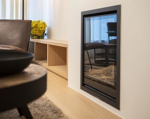 Moderne open haard in Meet Enjoy vakantiehuis, Nieuwpoort, West-Vlaanderen.
