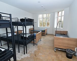 Comfortabele slaapruimte in Jeugdverblijfcentrum Schotte, ideaal voor groepen in het hart van Aalst, Belgi.