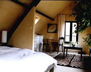 Ruime slaapkamer in Wingerd, vakantieaccommodatie in Vlaamse Ardennen, Oost-Vlaanderen, Belgi, met comfortabele bedden.