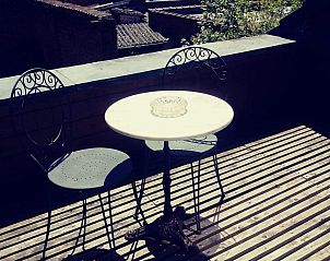 Charmant terras bij Air b&b huis Buizemont, Belgi, met uitzicht op de omgeving en ideale plek voor ontspanning.