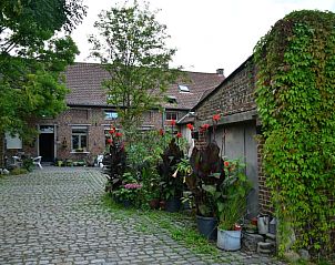 Green surroundings at Holiday home in Onkerzele, Geraardsbergen, with lush plants and rustic charm in East Flanders.