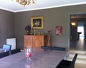 Stylish dining room in vacation home At Wendy's in Kluisbergen, perfect for cozy dinners.