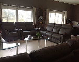 Comfortable living room in vacation home At Wendy's in Kluisbergen with ample seating.