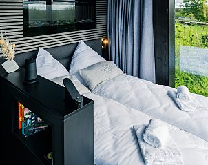 Modern vacation home NW081 in Schleiden, Eifel with sleek facade and natural surroundings.
