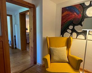 Gezellige leeshoek in Huisje in Nohen, vakantiehuis in Rijnland-Palts met kunstzinnige sfeer.