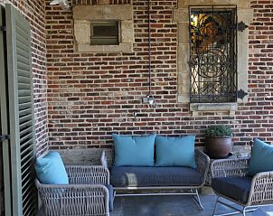 Comfortabele zitruimte op het terras van Trumpet House vakantiehuis in Kessel-Lo, Vlaams-Brabant, Belgi.