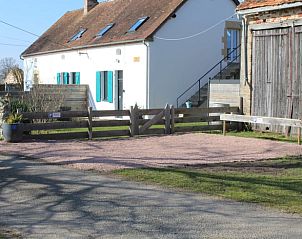 Cottage in Tortezais, a charming vacation home in Auvergne, France with rustic wooden barn and spacious outdoor area.