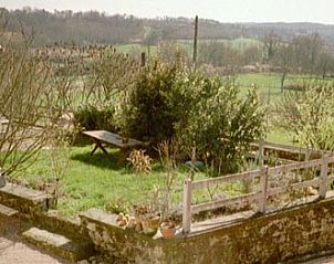 Enjoy the serene garden at vacation home ATELIER in Villars, Aquitaine, with beautiful views of the surrounding countryside.
