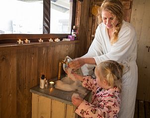 Enjoy luxury in the Tent Cottage with hot private shower in La Flocellire, Pays de la Loire, France, ideal for family vacations.