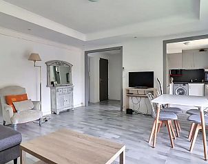 Bright living room in the St. Aygulf Apartment, located in Saint-Aygulf, Provence, featuring modern decor and a comfortable seating area.