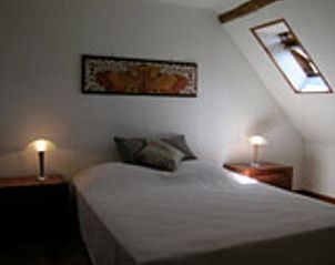Gezellige slaapkamer in Vakantiehuis in Oust, gelegen in de prachtige Midi Pyrenees, Frankrijk.