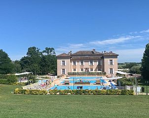 Vacation home Neuf Chateau de Barbet in Lombez, Midi-Pyrenees with swimming pool and green surroundings.
