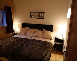 Gezellige slaapkamer in Chalet Adele, Saint Martin de Belleville, Rhone-Alphes. Perfect vakantiehuis voor een ontspannen verblijf.