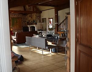 Gezellige binnenruimte van Vakantiehuisje in Saint-Priest-les-Fougres, Aquitaine, met authentieke Franse charme.