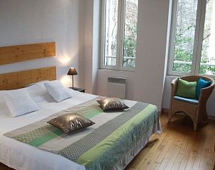 Attractive bedroom in Maison de Vacances au Sud de la France, vacation home in Agen, Aquitaine overlooking the garden.