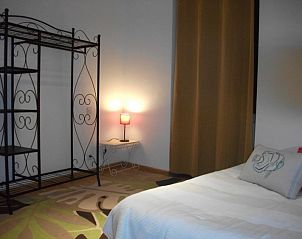 Attractive bedroom in Maison de Vacances au Sud de la France, Agen, Aquitaine, vacation home with elegant interior.