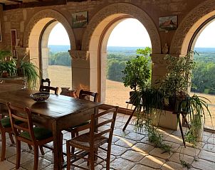 Cottage in Tourtoirac, vacation home in Aquitaine, France with rustic interior and panoramic views of nature.