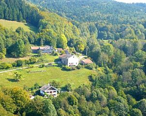 Cottage in Le Val d'Ajol, a charming vacation home surrounded by nature in Lorraine, France.