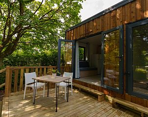 Curist pakket Cottage 1 bed in Vittel, Lotharingen: charmant vakantiehuis met zonnige veranda en groene omgeving.