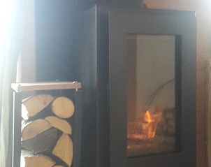 Gezellige open haard in Vakantiehuisje in Comblain au Pont, sfeervol verblijf in de Ardennen, Luik, Belgi.