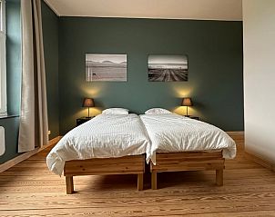 Sfeervolle slaapkamer in Vakantiehuis in Clavier - Ocquier, perfect voor ontspanning in de Ardennen, Luik, Belgi.