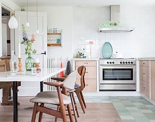 Eetruimte van Vakantiehuis in Hemelum, een gezellige plek in de Friese meren.