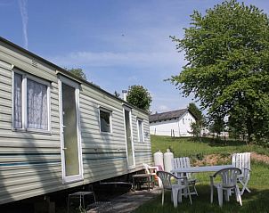 Vakantiehuisjes Pommier Rustique, gelegen in Durnal, biedt een rustige verblijfservaring in de Ardennen, Belgi.