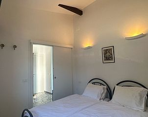 Cozy bedroom in vacation home Motta Piana 18, Porto Valtravaglia, Italian Lakes, Italy.