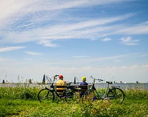 Vakantiehuisje in Woudsend, recreatie bij het water met fietsen en uitzicht op Slotermeer.