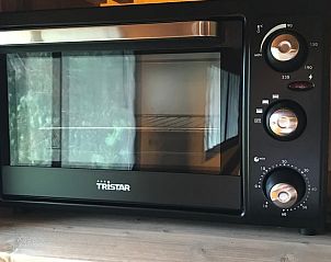 Vakantiehuisje in Woudsend, moderne keukenapparatuur in de lodge nabij de Friese meren.