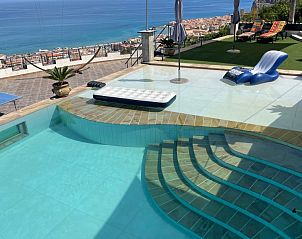 Enjoy breathtaking sea views from the pool of vacation home Maestrale in Cefal, Sicily.