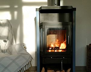 Gemtlicher Kamin im Ferienhaus Le FRNE in Paliseul, Ardennen, fr eine warme Atmosphre.