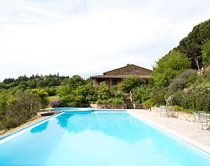 Enjoy the pool and green surroundings at Agriturismo Nobile di Montepulciano, a vacation home in beautiful Tuscany.